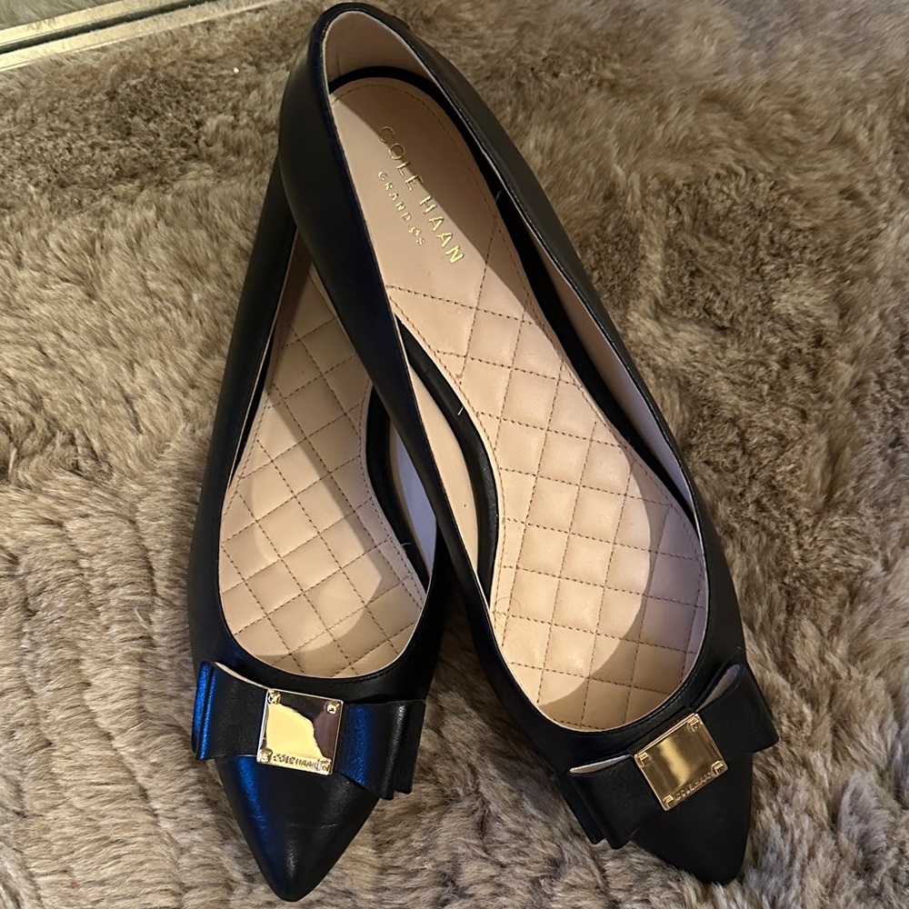 Cole Haan Black Flats with Gold Bow Accent